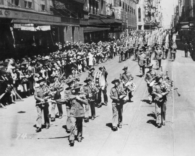 Members_of_the_2-19_Battalion_marching_down_Castlereagh_Street_near_the_corner_of_Hunter_Street_in_Sydney_CBD_during_September_1940.jpg