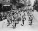 Members_of_the_2-19_Battalion_marching_down_Castlereagh_Street_near_the_corner_of_Hunter_Street_in_Sydney_CBD_during_September_1940.jpg